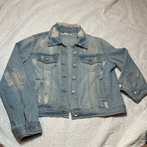 Distressed jean jacket